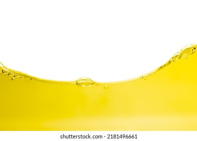 Vegatable oil surface, bubbles and  wave isolated on white background.