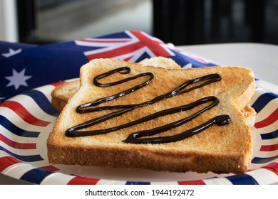 Vegemite Toast is an Iconic Traditional Australian Breakfast Food.  It is a spread made from yeast extract.  Commonly spread onto sandwiches and crackers. 
