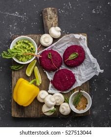 Vegetable Beetroot Fritters Before Cooking With Various Vegetables, Mushrooms, Avocado Guacamole And Herbs To A Veggie Burger. Concept Of Healthy Organic Food. Top View