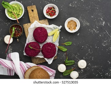 Vegetable Beetroot Patties Before Cooking With Various Vegetables, Mushrooms, Avocado Guacamole And Herbs To A Veggie Burger. Concept Of Healthy Organic Food. Top View