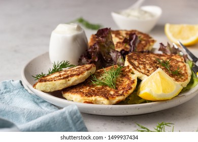 Vegetable (cauliflower) Pancakes (fritters) With Natural Yogurt Dressing And Dill.