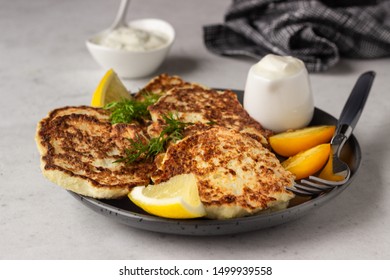 Vegetable (cauliflower) Pancakes (fritters) With Natural Yogurt Dressing And Dill.