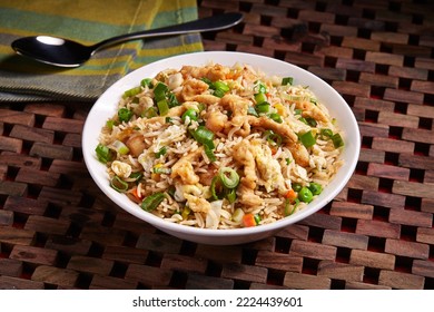Vegetable Chicken or Mixed Fried Rice served in dish isolated on table side view of middle east food