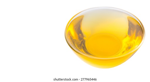 Vegetable Cooking Oil In A Clear Glass Bowl Over White Background