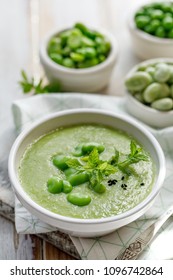 Vegetable Cream Soup. Broad Bean Soup Sprinkled With  Fresh Mint And Nigella. Delicious And Nutritious Vegan Food. Healthy Eating Concept.