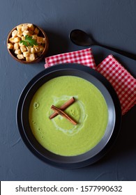 Vegetable Cream, Zucchini In Black Dishes On Black Rustic Background, Overhead View