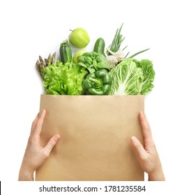 Vegetable Delivery In Paper Bag At Home Online Order On White Backround. Top View.