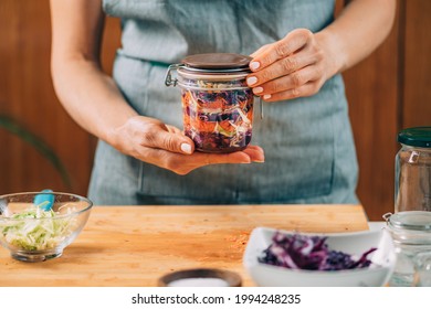 Vegetable Fermentation. Woman Holding Jar With Fermented Vegetables.