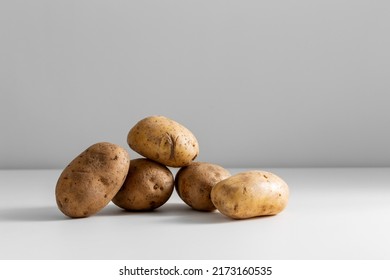 Vegetable, Food And Culinary Concept - Close Up Of Potatoes On Table