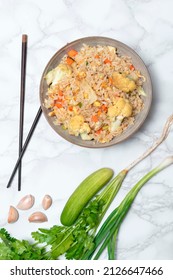 Vegetable Fried Rice With Cauliflower Carrot Egg In Bowl Isolated On White Background Close Up Has Chopsticks, Top View, Healthy Food Concept.