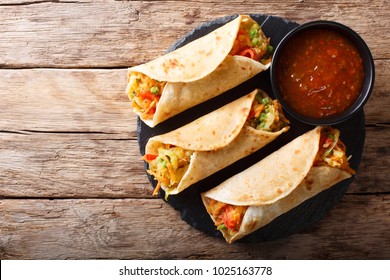 Vegetable Indian Rolls Are Filled With A Tasty Concoction Of Carrots, Potatoes, Pepper And Peas Cooked In A Blend Of Spices. Horizontal Top View From Above
