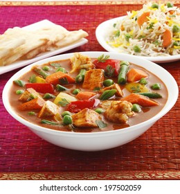 Vegetable Jalfrezi In Bowl With Roti And Rice, Indian Food