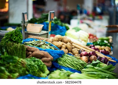 Vegetable market in Shanghai, China. Focus on potatoes.