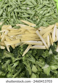 vegetable mixture of young corn broccoli and green beans