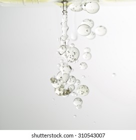 Vegetable Oil Poured Into Water