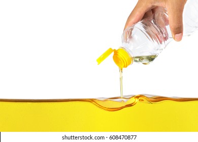 Vegetable oil pouring on vegetable oil background