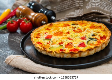 Vegetable Pie With Cherry Tomatoes, Grilled Peppers And Courgettes With Fresh Eggs And Fresh Cream