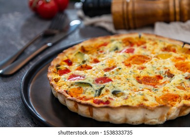 Vegetable Pie With Cherry Tomatoes, Grilled Peppers And Courgettes With Fresh Eggs And Fresh Cream