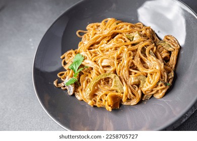 vegetable rice noodles soy sauce, coconut cream, glass noodle fresh meal food snack on the table copy space food background rustic top view - Shutterstock ID 2258705727