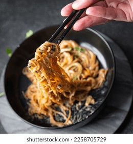 vegetable rice noodles soy sauce, coconut cream, glass noodle fresh meal food snack on the table copy space food background rustic top view - Shutterstock ID 2258705729