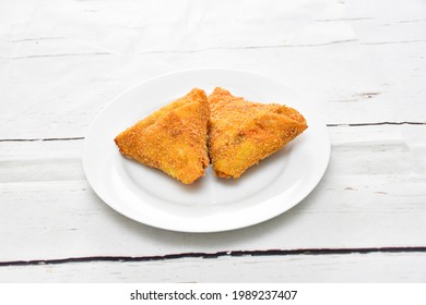 Vegetable Roll, Chicken Roll, Beef Roll, Egg Roll, Made By Deep Fide Crispy Layer Arranged In A White Ceramic Dish With White Paint Wooden Background, Isolated.