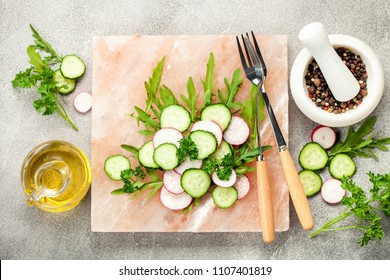 Vegetable Salad On Pink Salt Block. Top View