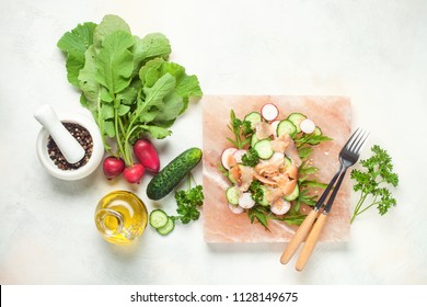 Vegetable Salad On Pink Salt Block. Top View