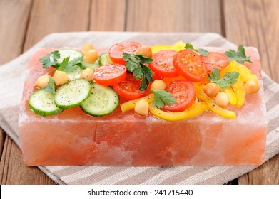 Vegetable Salad On Pink Salt Block