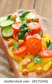 Vegetable Salad On Pink Salt Block