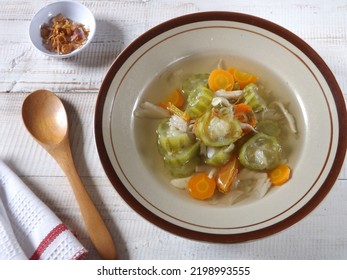 Vegetable Soup With Luffa Fruit Or Oyong Or Gambas, Carrot, And Mushroom As Ingredients Seasoning With Pepper, Garlic, Shallot, And Tomato. Indonesian Home Dish. Focus Selection. 
