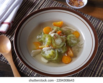 Vegetable Soup With Luffa Fruit Or Oyong Or Gambas, Carrot, And Mushroom As Ingredients Seasoning With Pepper, Garlic, Shallot, And Tomato. Indonesian Home Dish. Focus Selection. 