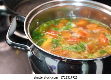 Vegetable Soup Simmering In A Pot