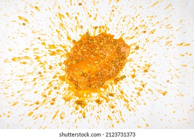 Vegetable soup splattered in a mess that looks like vomit. Isolated on a white background 