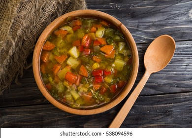 Vegetable soup in a wooden plate. Useful and tasty food. - Powered by Shutterstock