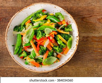 Vegetable stir fry in a plate. Top view