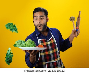 Vegetables In Air Young Chef Boy Isolated Images With Apron Food Or Hotel Management Concept