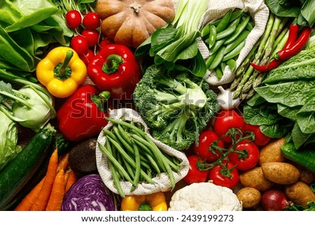 Vegetables background. Various vegetables on kitchen table. Clean eating, healthy food concept, flat lay, top down view