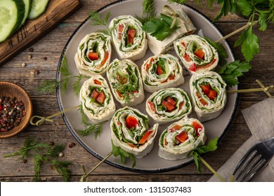 Vegetables And Cream Cheese Roll Ups, Selective Focus, Wooden Background