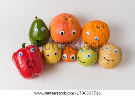 Vegetables and fruits characters with Googly eyes and funny faces. Proper nutrition concept.