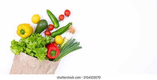 vegetables in grocery paper bag - Shutterstock ID 1914103570