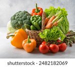 Vegetables Isolated on White. Vegetables Basket: Fresh Broccoli, Onions, Tomatoes, Paprikas, Green Beans and Other Fresh Garden Produce. Horizontal Studio Photo - Solid White Background