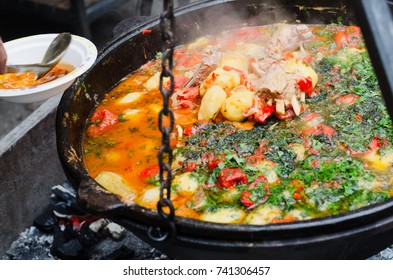 Vegetables With Meat Stewed In A Cauldron. Street Food, Food Festival.