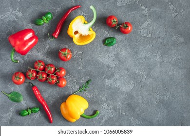 Vegetables on black background. Frame made of fresh vegetables. Tomatoes, peppers, green leaves. Flat lay, top view, copy space - Powered by Shutterstock