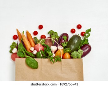 Vegetables in paper bag on white background. - Shutterstock ID 1892755741