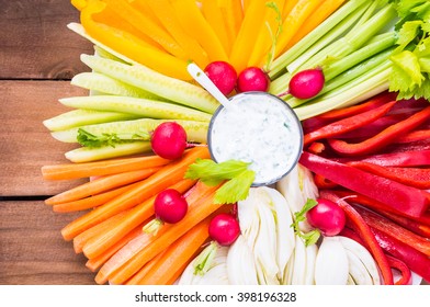 Vegetables Rainbow Plate With Dip Top View On Wood Rustic Background, Text Space.Diet, Healthy Veg Food Concept.