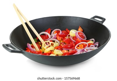 Vegetables In Wok Isolated On White