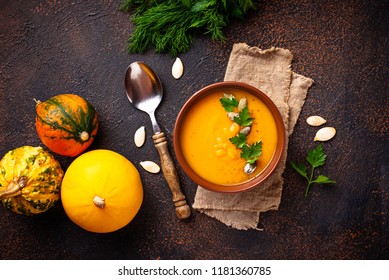 Vegetarian autumn  pumpkin cream soup with seeds