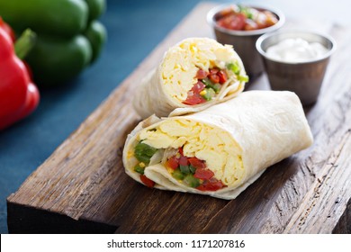 Vegetarian breakfast burrito with eggs and bell pepper