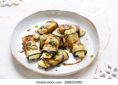 Vegetarian Canapes Of Halloumi Cheese Wrapped In Grilled Aubergine