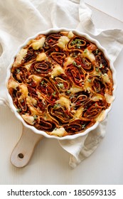 Vegetarian Casserole, Tortilla Pinwheels With Vegetables And Cheese Sprinkled With Fresh Herbs Served In A Baking Dish Top View